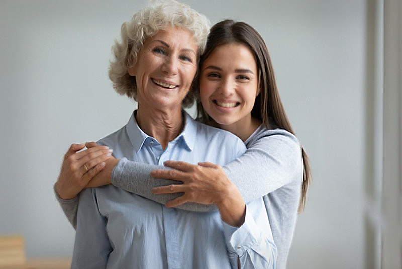 Happy Senior Lady and Caregiver