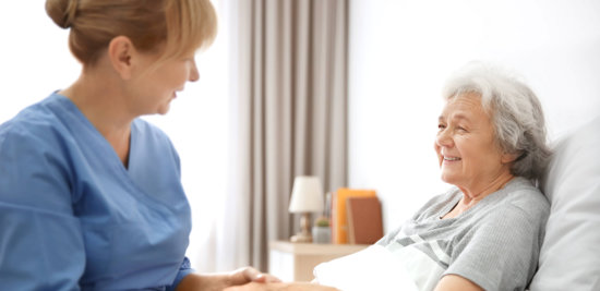 Happy Senior Woman with a Nurse